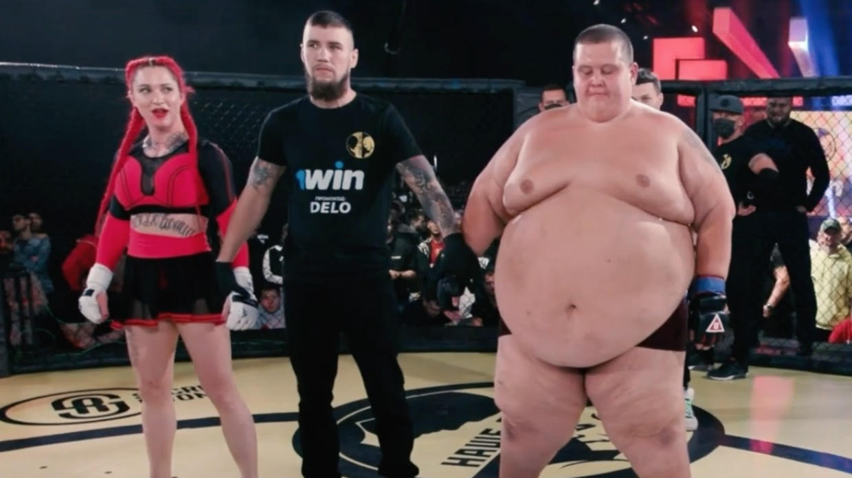 Watch Female fighter Darina Madzyuk Defeats A 400 Pound Man In An MMA fight